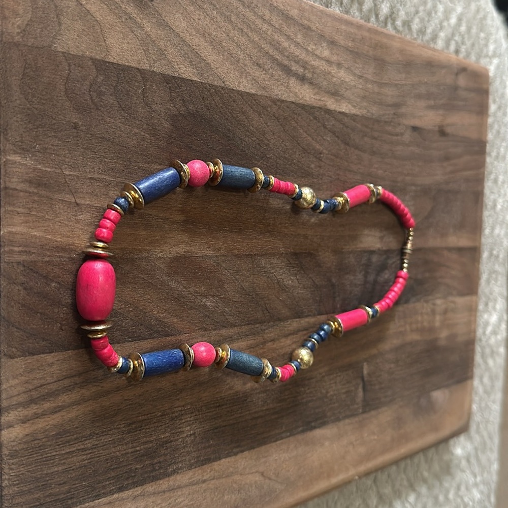 Pink and Blue Wooden Bead Necklace with Vibrant Design